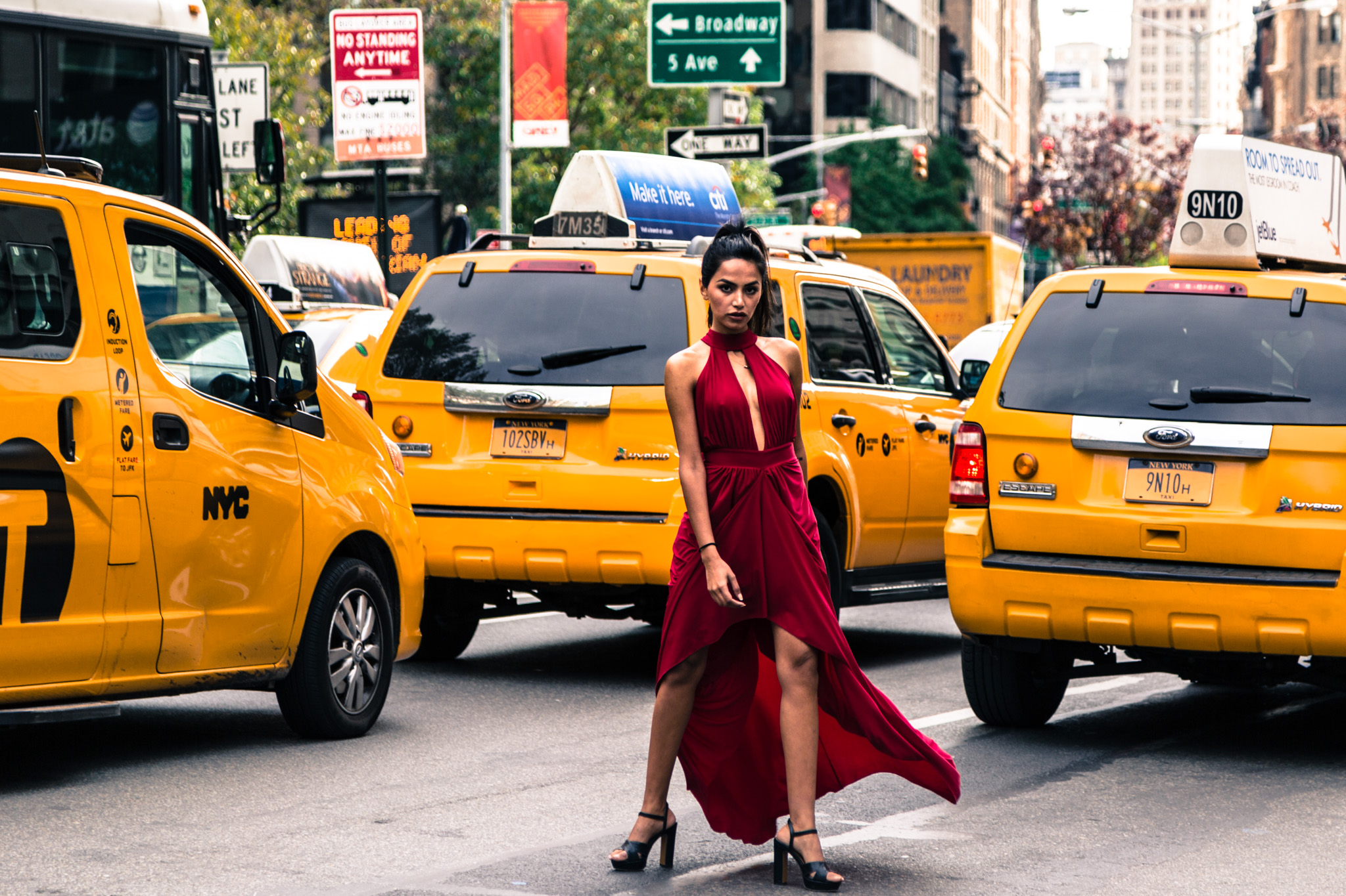 A beautiful girl in a red dress in NYC